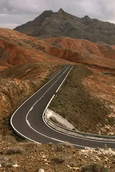Mountain road between La Pared and Pajara, Fuerteventura, Canary Islands. Creator: Peter Thompson
