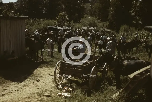 Mountaineers and farmers trading mules and horses on "Jockey St.,", Campton, Wolfe County, Ky., 1940 Creator: Marion Post Wolcott.