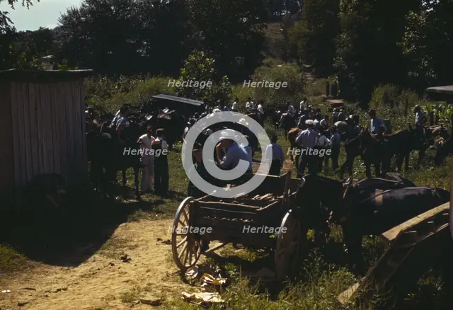 Mountaineers and farmers trading mules and horses on "Jockey St.,", Campton, Wolfe County, Ky., 1940 Creator: Marion Post Wolcott.