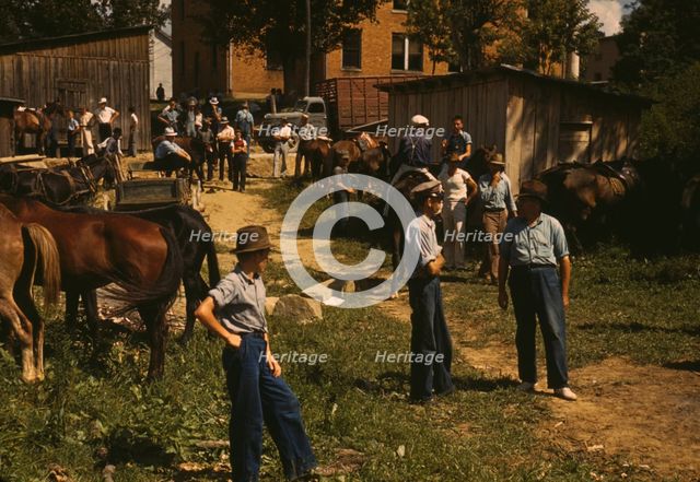 Mountaineers and farmers trading mules and horses on "Jockey St.,", Campton, Wolfe County, Ky., 1940 Creator: Marion Post Wolcott.