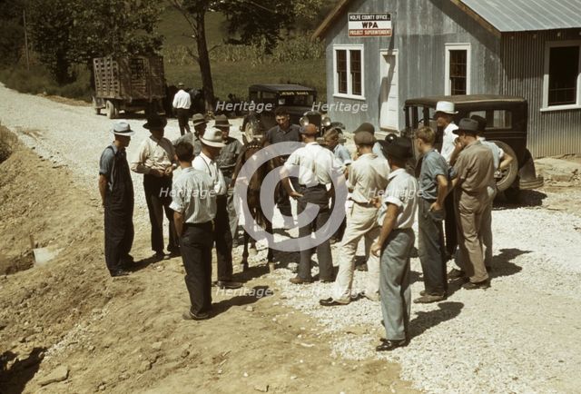 Mountaineers and farmers trading mules and horses on "Jockey St.,", Campton, Wolfe County, Ky., 1940 Creator: Marion Post Wolcott.
