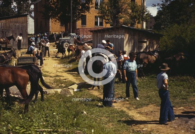 Mountaineers and farmers trading mules and horses on "Jockey St.,", Campton, Wolfe County, Ky., 1940 Creator: Marion Post Wolcott.