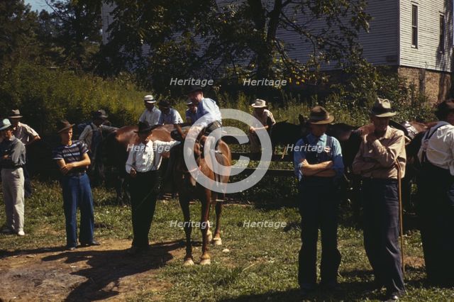Mountaineers and farmers trading mules and horses on "Jockey St.,", Campton, Wolfe County, Ky., 1940 Creator: Marion Post Wolcott.