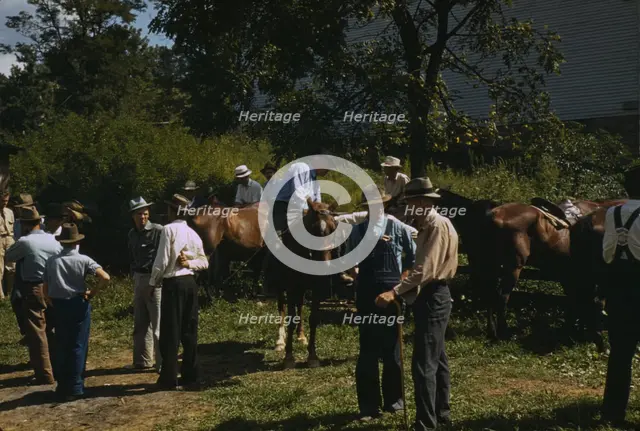 Mountaineers and farmers trading mules and horses on "Jockey St.,", Campton, Wolfe County, Ky., 1940 Creator: Marion Post Wolcott.