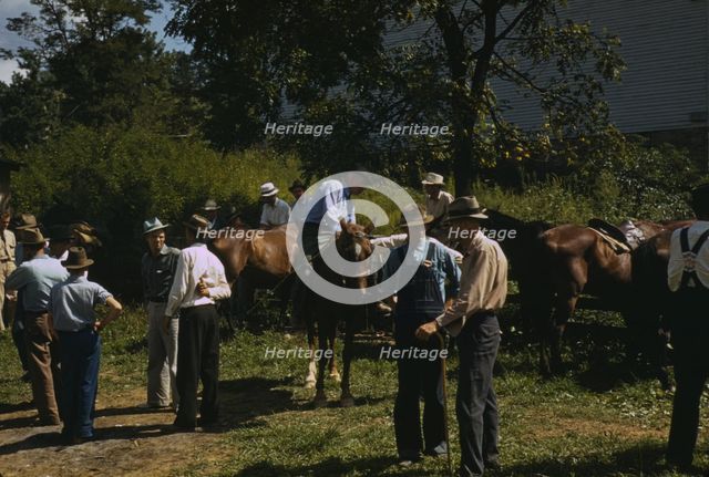 Mountaineers and farmers trading mules and horses on "Jockey St.,", Campton, Wolfe County, Ky., 1940 Creator: Marion Post Wolcott.