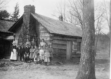 Mountaineers Cabin And Family of 15, 1913. Creator: Harris & Ewing