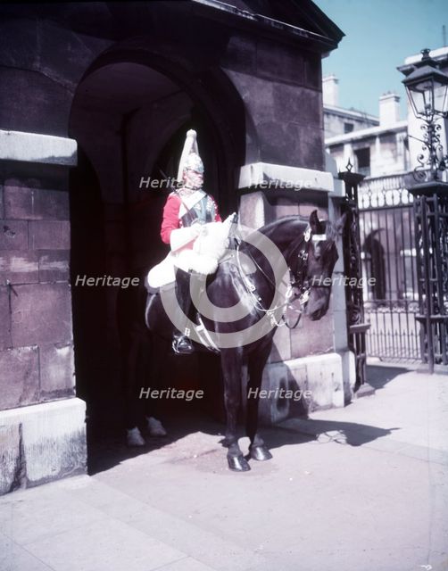 Mounted Horse Guard, Whitehall, London, c1955.  Creator: Arthur Charles Kirby Ware.