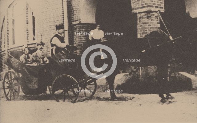 Moura Budberg with her first husband von Benckendorf in a carriage at their Estonian estate, 1912. Artist: Anonymous  
