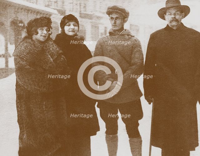 Moura Budberg (second from left) with Maxim Gorky (right), c. 1920. Artist: Anonymous  