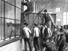 Moving the lions at the Zoological Society's Gardens, 1876. Creator: Unknown