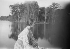 Mower, Margaret, Miss, seated outdoors, not before 1916. Creator: Arnold Genthe