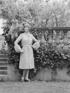 Moylair, Catherine, Miss, standing outdoors, 1928 Creator: Arnold Genthe