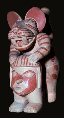 Mochica stirrup-spout vessel of a male figure with a jaguar's head, 3rd century