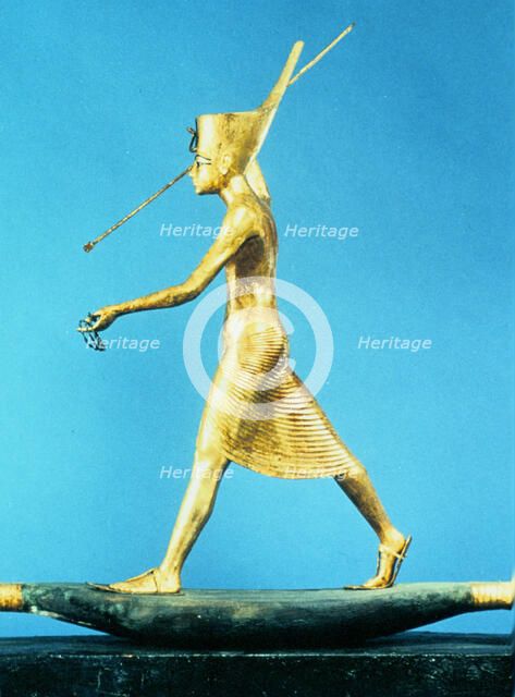 Model of the Pharaoh Tutankhamun on a reed boat spearing fish, Ancient Egyptian, c1325 BC. Artist: Unknown