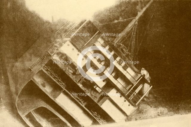 'Model Showing The "Laurentic" As She Originally Lay, 120 Feet Below The Surface', c1930. Creator: Unknown.