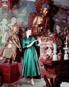 Model showing an evening dress in oriental style, 1950s. Creator: Göran Algård