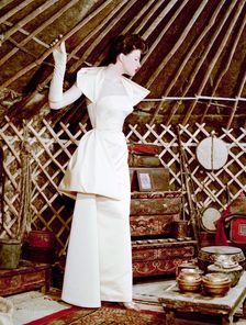 Model showing an evening dress in oriental style, 1950s. Creator: Göran Algård