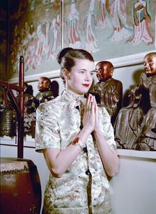 Model wearing an oriental style jacket, 1950s. Creator: Göran Algård