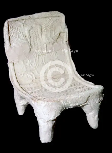Model terracotta chair from Ur with relief design of two birds. Artist: Unknown