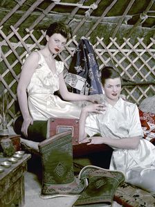 Models showing nightdresses in oriental style, 1950s. Artist: Göran Algård
