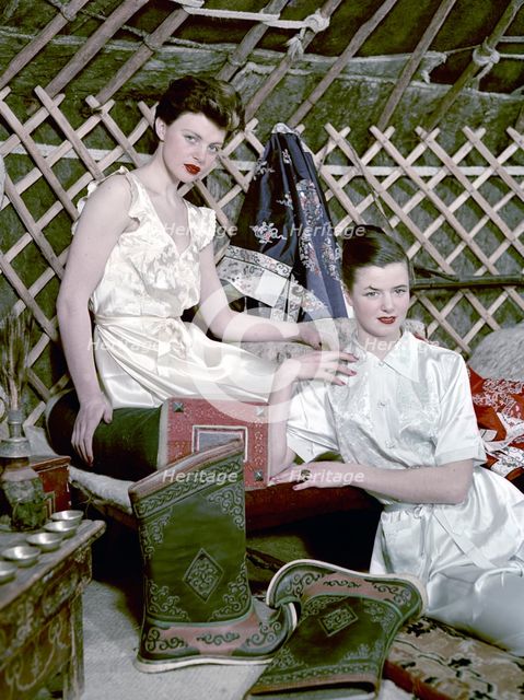 Models showing nightdresses in oriental style, 1950s. Creator: Göran Algård.