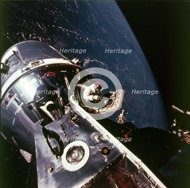 Module pilot David Scott emerging from Apollo 9 spacecraft, 6 March 1969. Creator: Russell Schweickart.