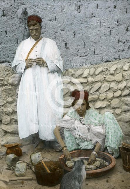 Mohamed Ben Ali and his wife, El Kantara, Tunisia. Artist: Unknown