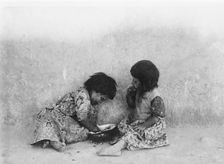 Moki melon eaters, c1900. Creator: Edward Sheriff Curtis