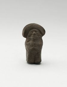 Mold-Made Blackware Pendant with Rounded Headdress, c. A.D. 100/600. Creator: Unknown