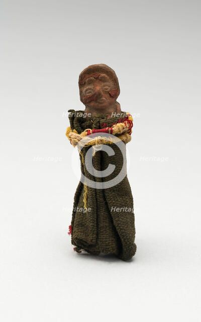 Mold-Made Female Figurine Wrapped in Cloth and Tied with String, c. A.D. 100/600. Creator: Unknown.