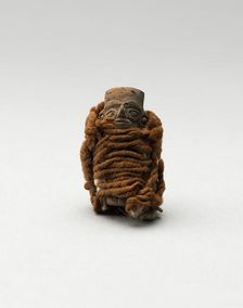 Mold-Made Figurine Wrapped in Wool String, A.D. 100/600. Creator: Unknown