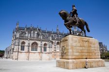 Monastery and statue of Nuno Alvares Pereira, Monastery of Batalha, Batalha, Portugal, 2009. Creator: Samuel Magal