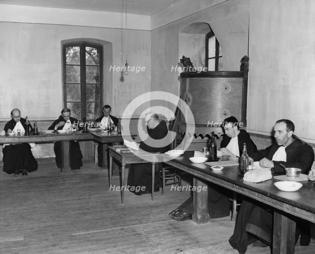 Monks at dinner in the refectory, Asile St Leon, France, c1947-1951. Artist: Unknown