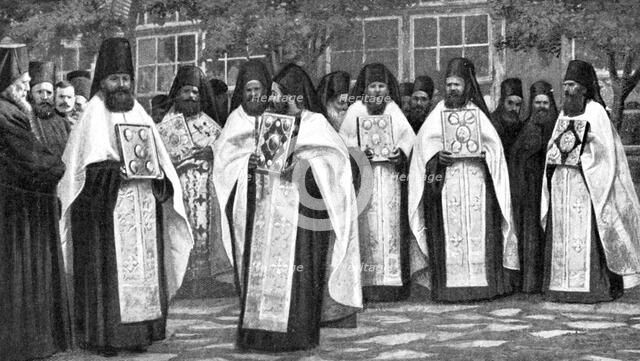 Monks of the Greek church carrying volumes of the Liturgy, Greece, 1922. Artist: Unknown