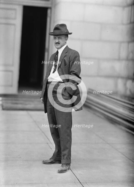 Monorail Subway, Capitol To Senate - Man Who Installed System, 1912. Creator: Harris & Ewing.