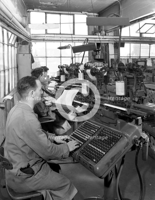 Monotype keyboards in operation at a printing company, Mexborough, South Yorkshire, 1959. Artist: Michael Walters