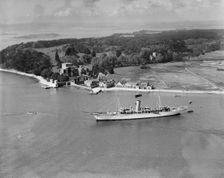 Montague Grahame-White's steam yacht Alacrity and Brownsea Island, Dorset, from the east, 1933. Artist: Aerofilms