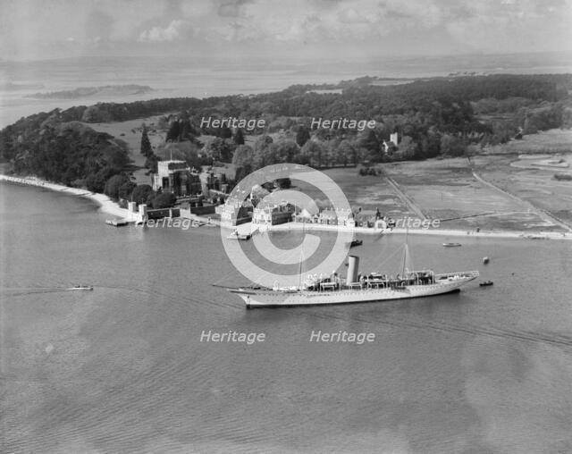 Montague Grahame-White's steam yacht 'Alacrity' and Brownsea Island, Dorset, from the east, 1933. Artist: Aerofilms.