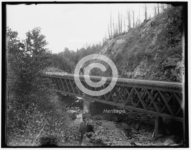 Montreal River, bridge at rock cut, Wisconsin, between 1880 and 1899. Creator: Unknown.