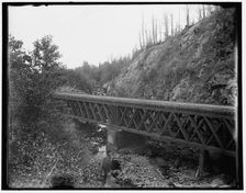 Montreal River, bridge at rock cut, Wisconsin, between 1880 and 1899. Creator: Unknown