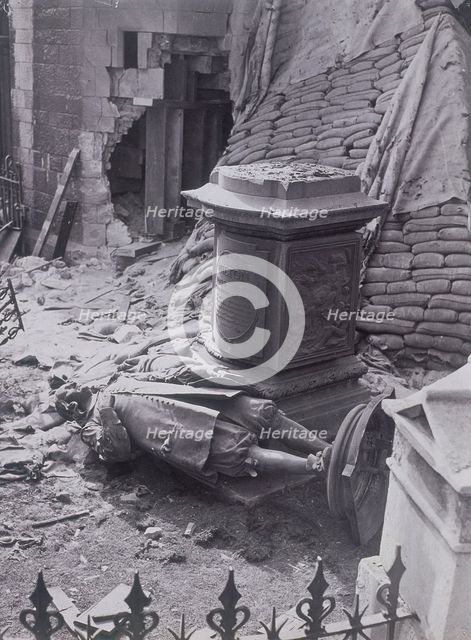 Monument to John Milton and part of St Giles without Cripplegate after bomb damage, c1940. Artist: Anon