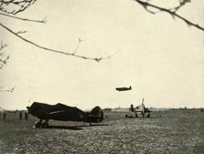 Morane 406 at Vassincourt Aerodrome with French Curtiss Hawk and Hurricane 1939-1940, (1941). Creator: Unknown