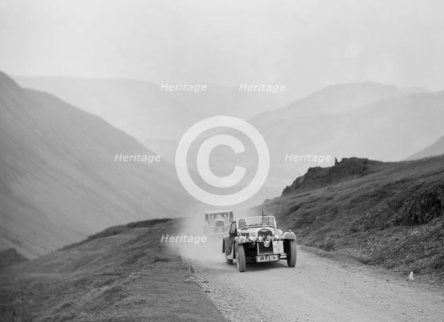 Morgan 4/4 2-seater of Miss DL Bean competing in the RAC Rally, 1938. Artist: Bill Brunell.