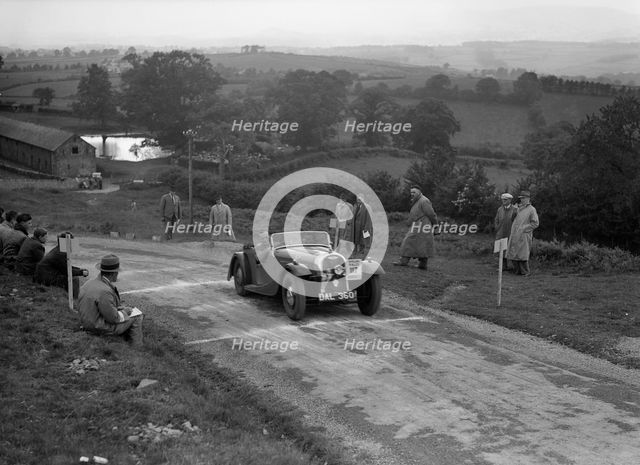 Morgan 4/4 2-seater sports of GN Scott competing in the South Wales Auto Club Welsh Rally, 1937 Artist: Bill Brunell.