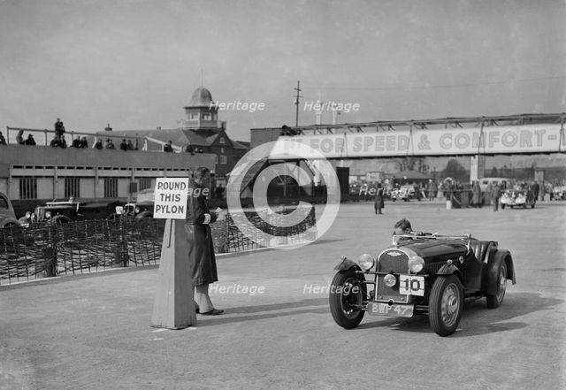 Morgan 4/4 competing in the JCC Rally, Brooklands, Surrey, 1939. Artist: Bill Brunell.