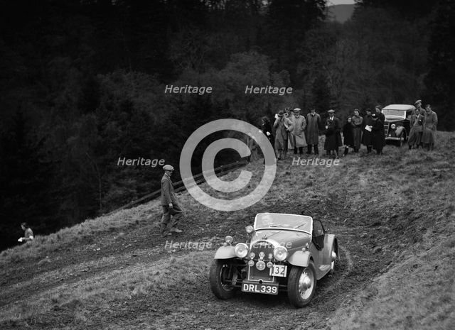Morgan 4/4 of RD Harris competing in the MCC Edinburgh Trial, Roxburghshire, Scotland, 1938. Artist: Bill Brunell.