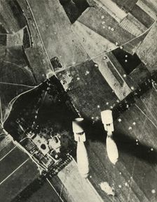 More British Bombs on an Enemy-Held Aerodrome 1939-1940, (1941). Creator: Unknown
