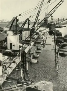 "More New Quays (The Royal Albert Docks Will Obtain a Stretch Almost a Mile Long)" 1937. Creator: Fox