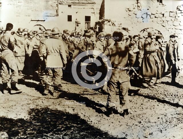 Moroccan Tirailleurs capture a troop of German soldiers, Cardito, Italy, c1944. Artist: Unknown