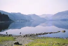 Morning mist in Derwentwater, towards the Jaws of Borrowdale Cumberland, 20th century. Artist: CM Dixon